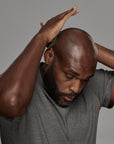black man using frederick benjamin easy primer on head, best product for men who shave facial hair and head, best shaving product for bald men of color, best product for pain free shaving