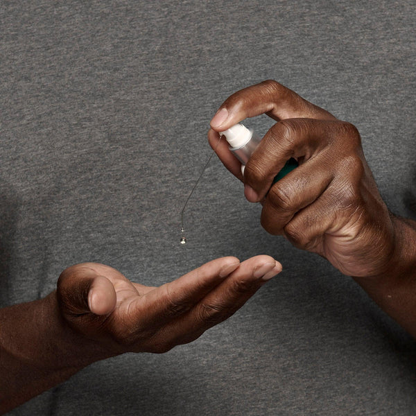 black man using frederick benjamin pre shave easy primer, best product for black men who shave