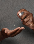 black man using frederick benjamin pre shave easy primer, best product for black men who shave